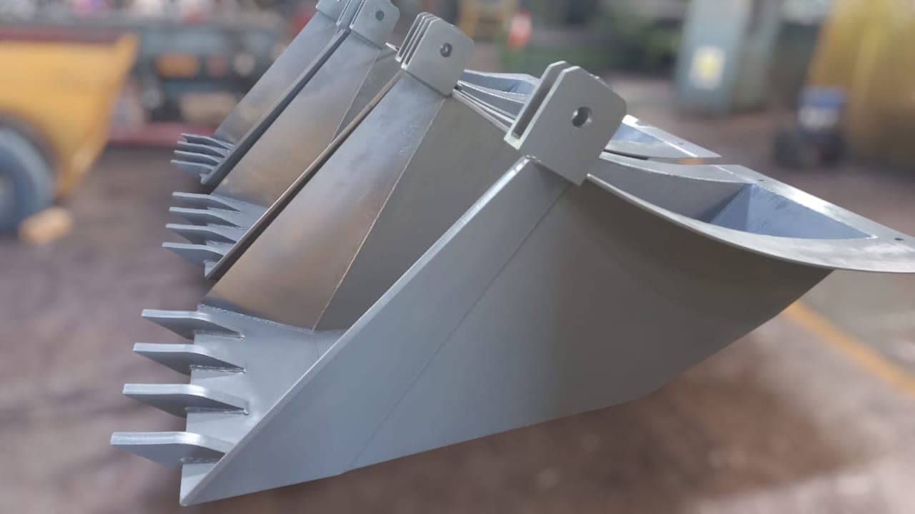 Fabricated steel bucket component with teeth in the workshop
